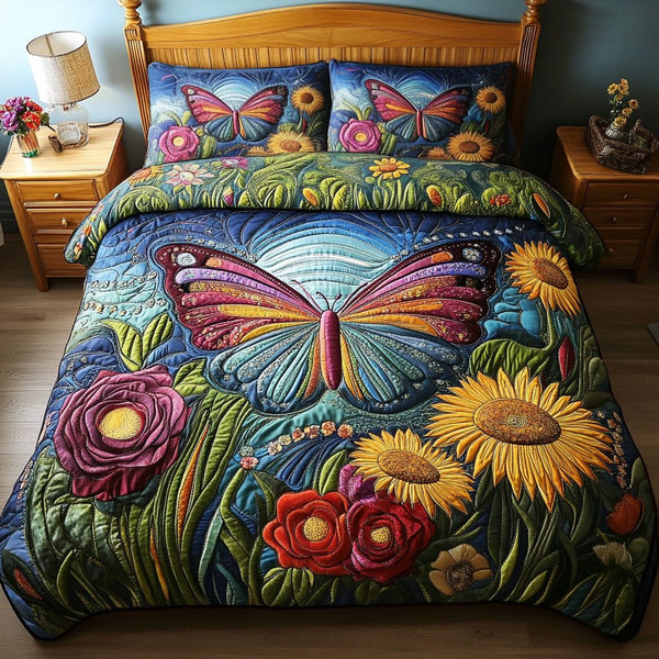Radiant Wings quilted 3-piece bedding set on a made bed with two matching pillow shams