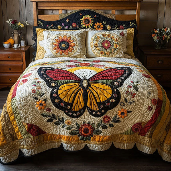 Radiant Wings quilted 3-piece bedding set on a made bed with two matching pillow shams