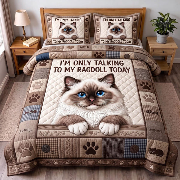 Ragdoll Mom quilted 3-piece bedding set on a made bed with two matching pillow shams