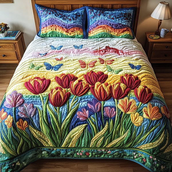 Rainbow Bloom quilted 3-piece bedding set on a made bed with two matching pillow shams