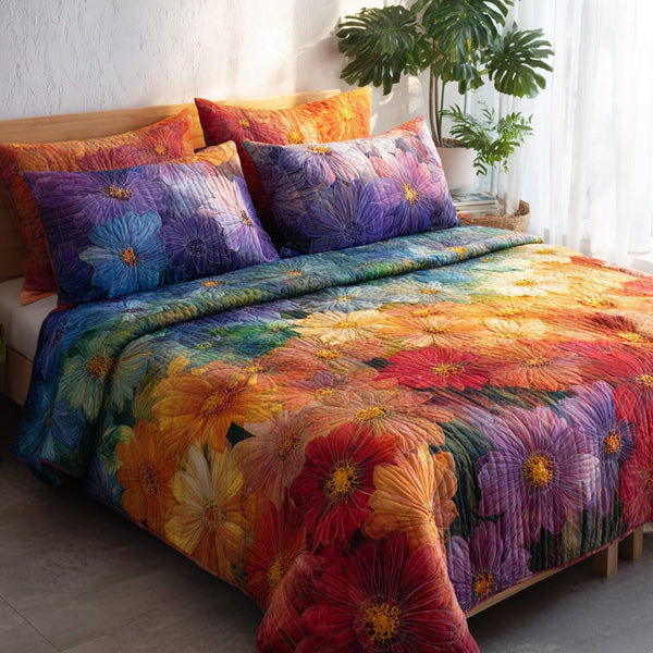 Rainbow Blooms quilted 3-piece bedding set on a made bed with two matching pillow shams