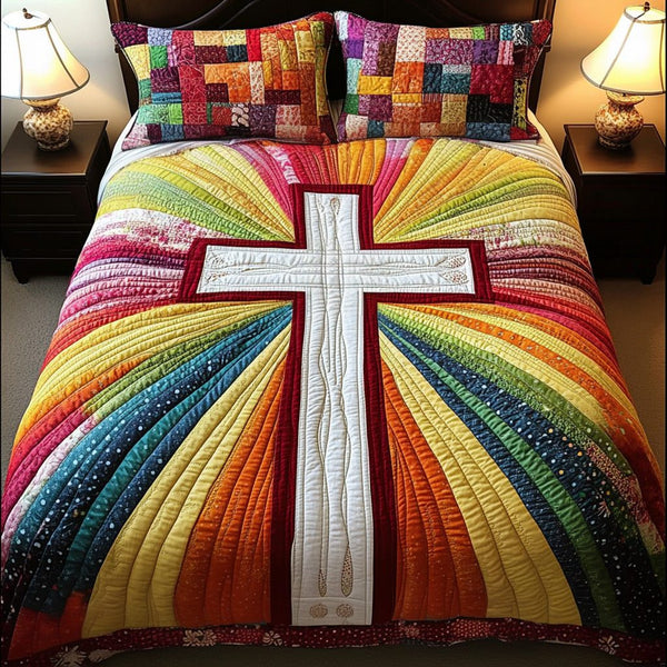 Rainbow Cross quilted 3-piece bedding set on a made bed in a softly lit bedroom
