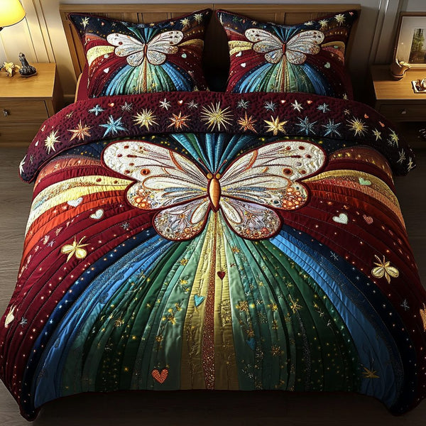 Rainbow Dreams quilted 3-piece bedding set on a made bed with two matching pillow shams