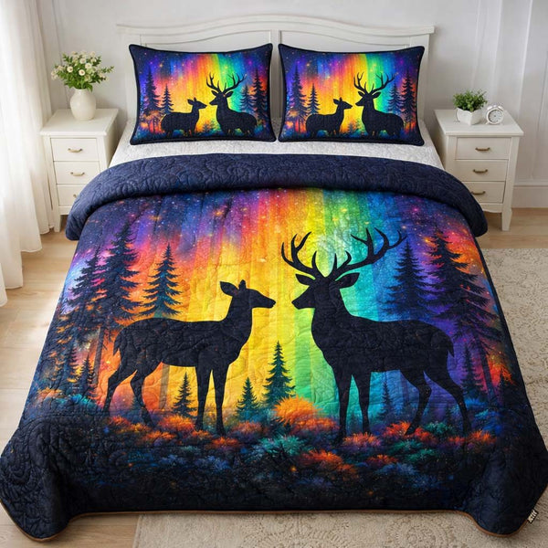 Rainbow Forest Deer quilted 3-piece bedding set on a made bed with two matching pillow shams