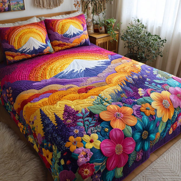 Rainbow Garden quilted 3-piece bedding set on a made bed with two matching pillow shams