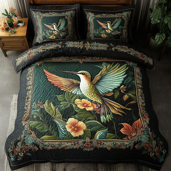 Rainbow Glider quilted 3-piece bedding set on a made bed with two matching pillow shams