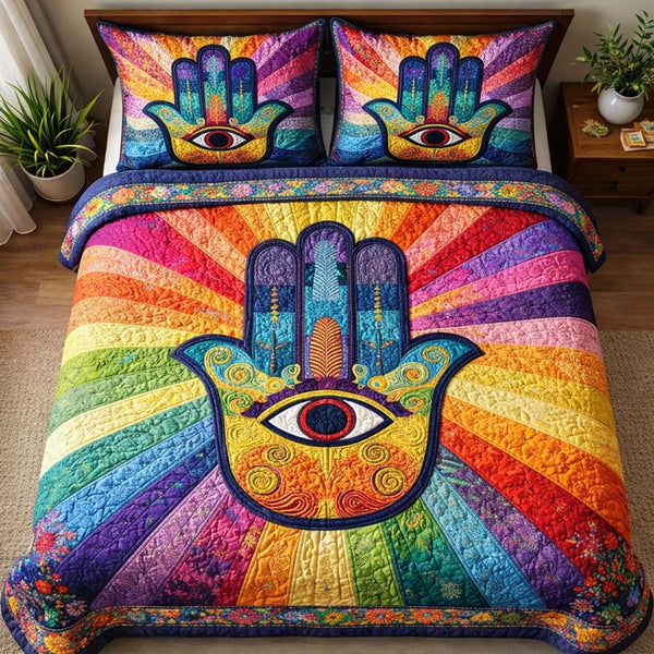 Rainbow Hamsa Radiance quilted 3-piece bedding set on a made bed with two matching pillow shams