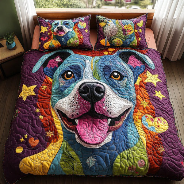 Rainbow Pit quilted 3-piece bedding set on a made bed with two matching pillow shams