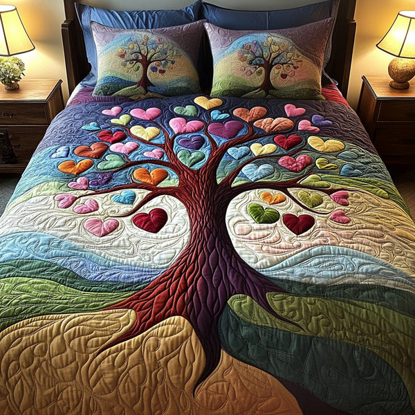 Rainbow Roots quilted 3-piece bedding set on a made bed with two matching pillow shams