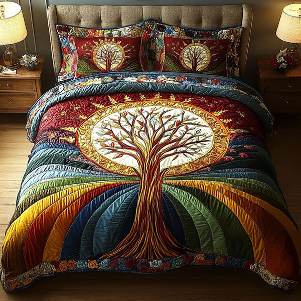 Rainbow Serenity quilted 3-piece bedding set on a made bed with two matching pillow shams