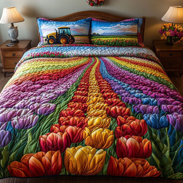 Rainbow Tulip Journey quilted 3-piece bedding set on a made bed with two matching pillow shams