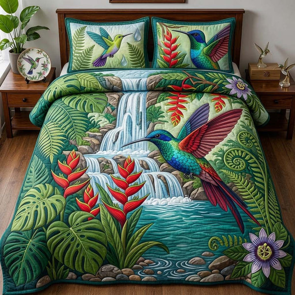 Rainforest Jewel Cascade quilted 3-piece bedding set on a made bed with two matching pillow shams