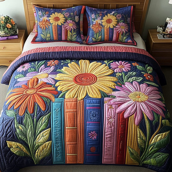 Reading Garden quilted 3-piece bedding set on a made bed with two matching pillow shams