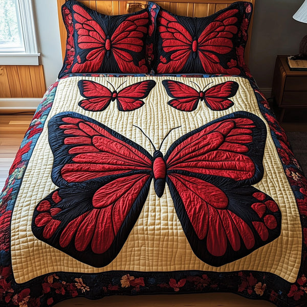 Red Butterfly quilted 3-piece bedding set on a made bed with two matching pillow shams