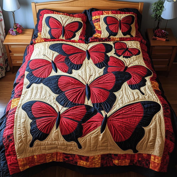 Red Butterfly quilted 3-piece bedding set on a made bed with two matching pillow shams