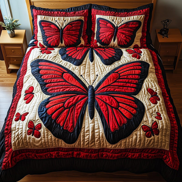Red Butterfly quilted 3-piece bedding set on a made bed with two matching pillow shams
