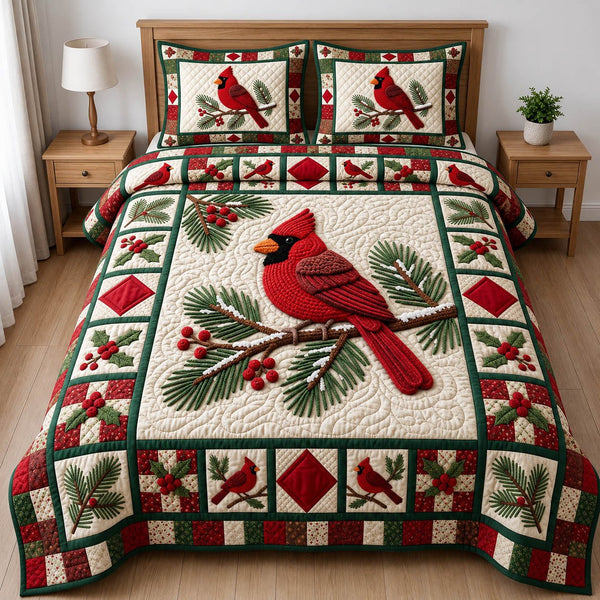 Red Cardinal quilted 3-piece bedding set on a made bed with two matching pillow shams