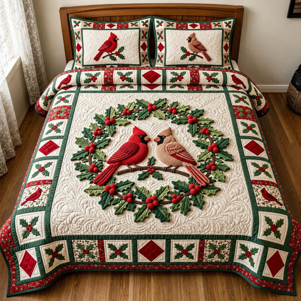 Red Cardinal quilted 3-piece bedding set on a made bed with two matching pillow shams
