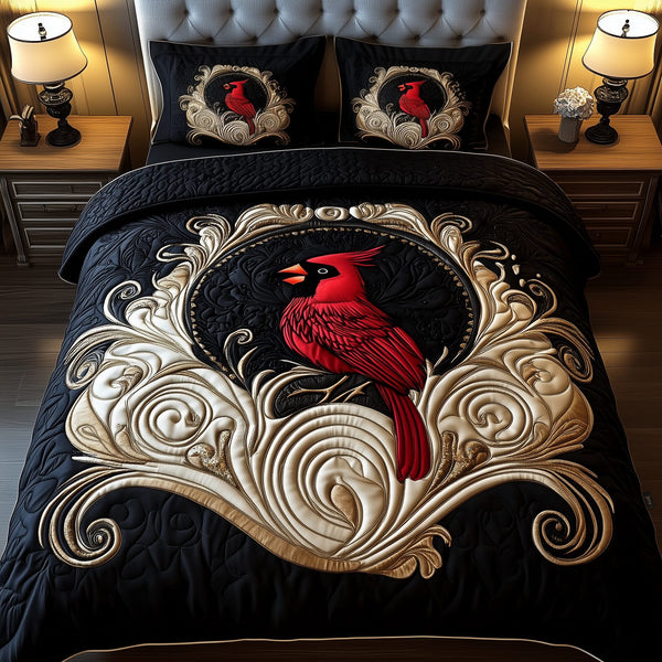 Red Cardinal quilted 3-piece bedding set on a made bed with two matching pillow shams