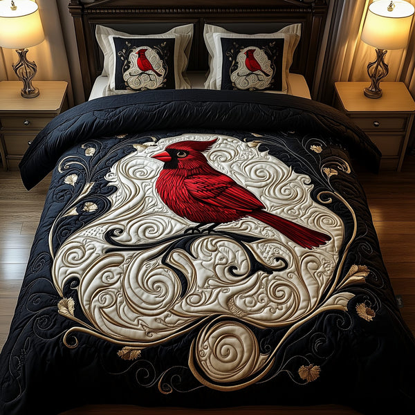 Red Cardinal quilted 3-piece bedding set on a made bed with two matching pillow shams