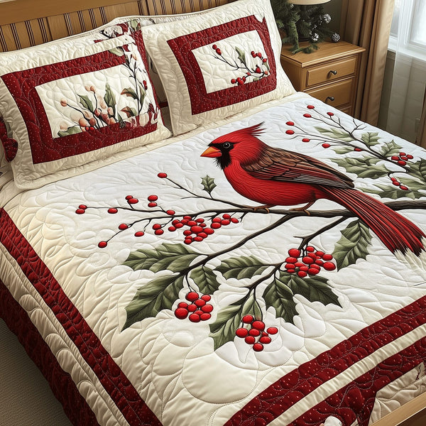 Red Cardinal Serenity quilted 3-piece bedding set on a made bed with two matching pillow shams