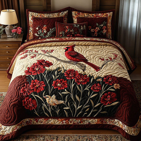 Red Carnations of Buckeye State quilted 3-piece bedding set on a made bed with two matching pillow shams