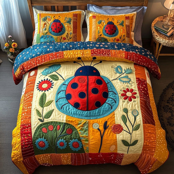 Red Charm quilted 3-piece bedding set on a made bed with two matching pillow shams