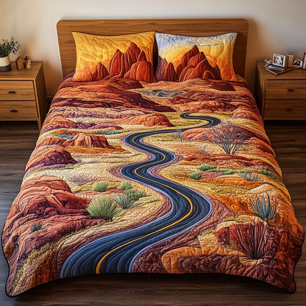 Red Rock Majesty quilted 3-piece bedding set on a made bed with two matching pillow shams