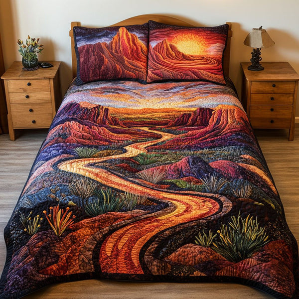 Red Rocks Serenity quilted 3-piece bedding set on a made bed with two matching pillow shams