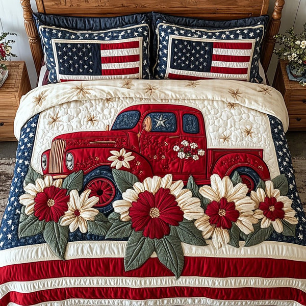 Red Truck USA quilted 3-piece bedding set on a made bed in a warmly lit bedroom