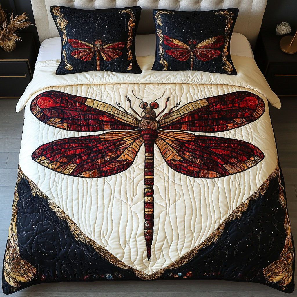 Red Twilight Dragonfly quilted 3-piece bedding set on a made bed with two matching pillow shams