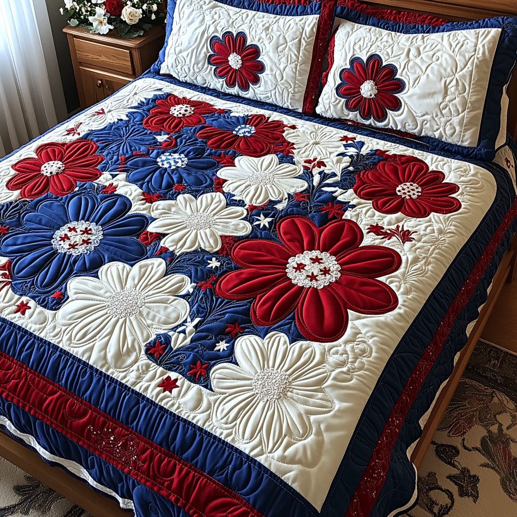 Red White and Blooms quilted 3-piece bedding set on a made bed with two matching pillow shams