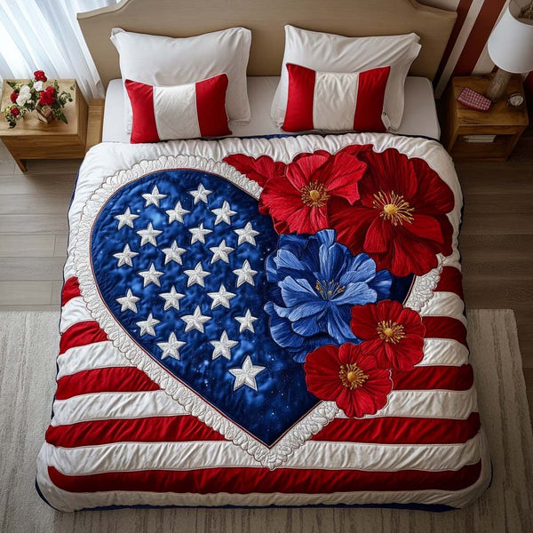 Red White Bloom quilted 3-piece bedding set on a made bed with two matching pillow shams
