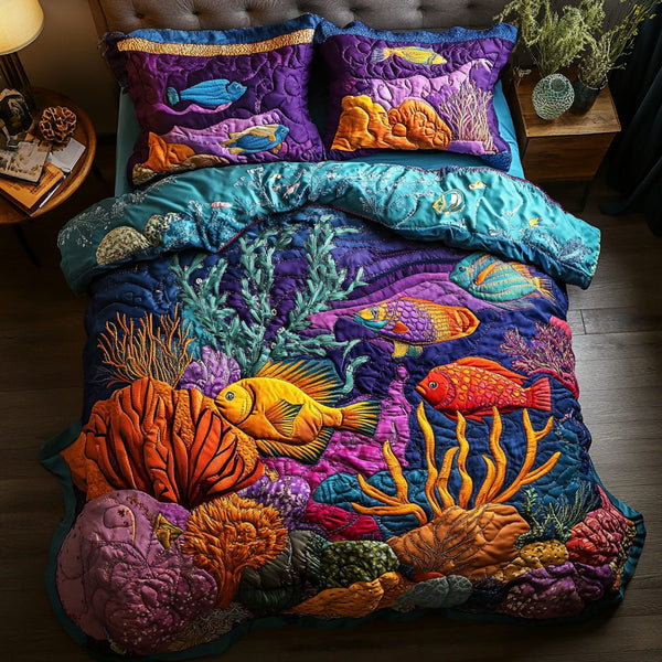 Reef Delight quilted 3-piece bedding set on a made bed in a light coastal bedroom