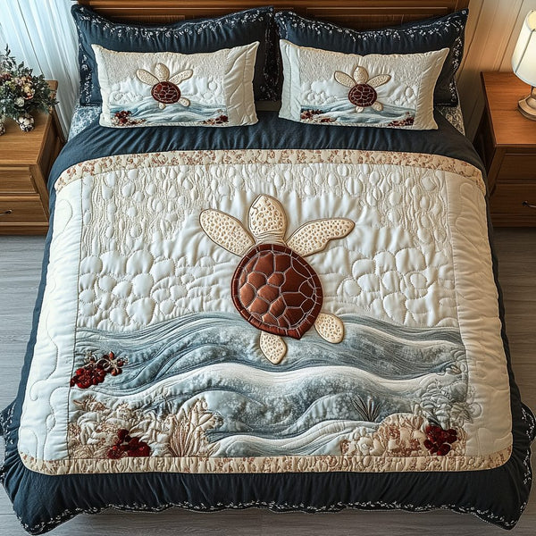 Reef Glider quilted 3-piece bedding set on a made bed in a light coastal bedroom