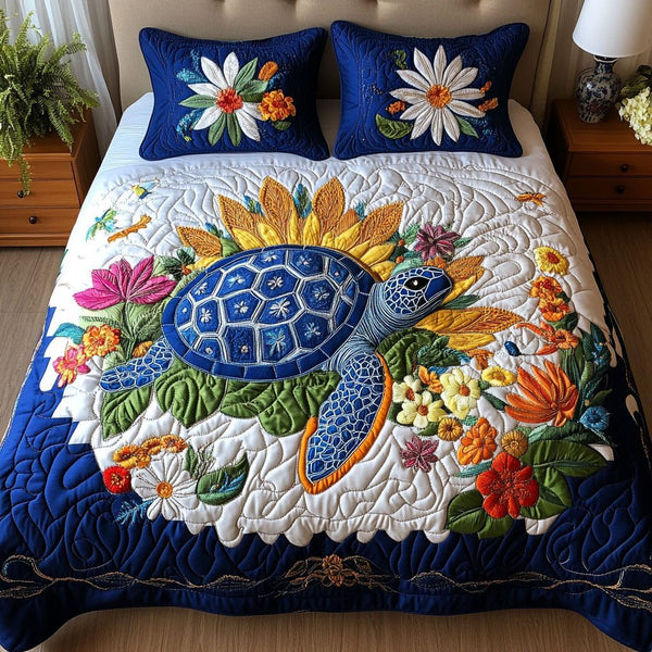 Reef Harmony quilted 3-piece bedding set on a made bed in a light coastal bedroom