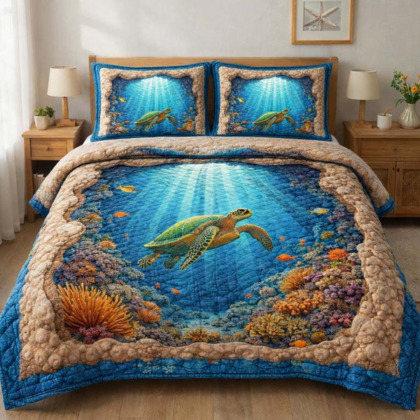 Reef Turtle quilted 3-piece bedding set on a made bed in a light coastal bedroom