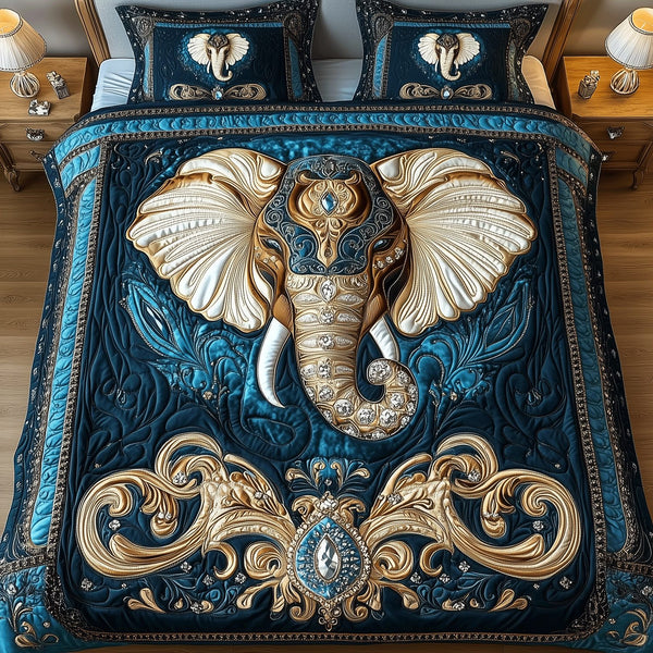 Regal Elephant Bliss quilted 3-piece bedding set on a made bed with two matching pillow shams