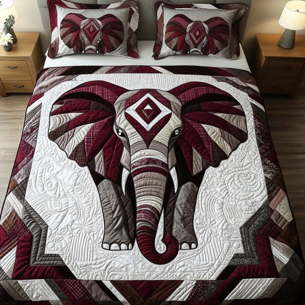 Regal Essence quilted 3-piece bedding set on a made bed with two matching pillow shams