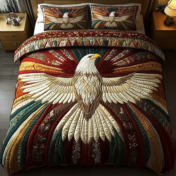 Regal Flight quilted 3-piece bedding set on a made bed with two matching pillow shams