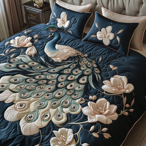 Regal Magnolia quilted 3-piece bedding set on a made bed with two matching pillow shams