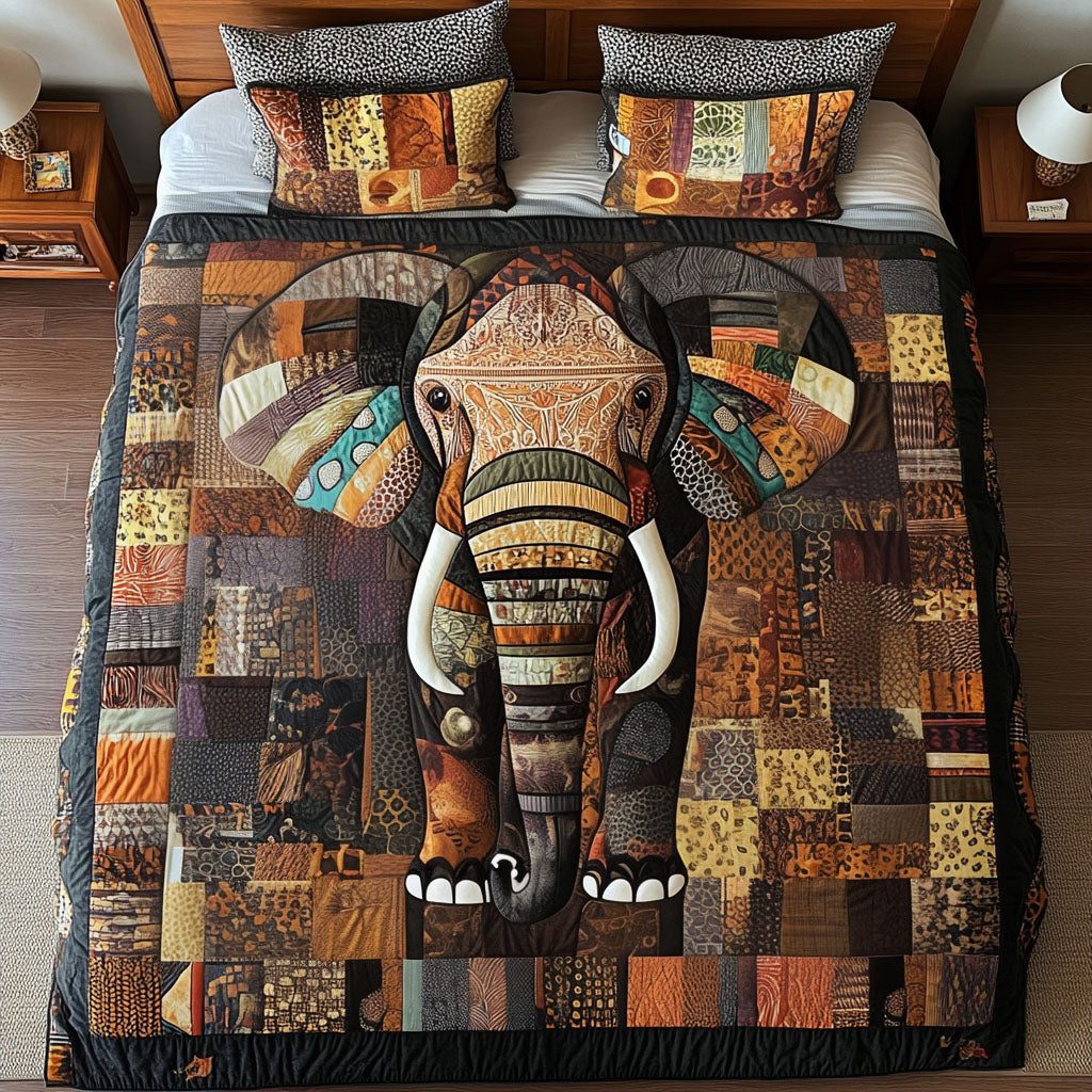 Regal Tusker quilted 3-piece bedding set on a made bed with two matching pillow shams