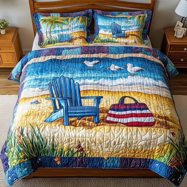 Relaxing Beach quilted 3-piece bedding set on a made bed in a light coastal bedroom