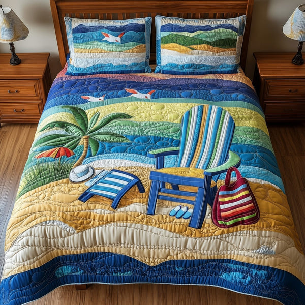 Relaxing Beach quilted 3-piece bedding set on a made bed in a light coastal bedroom