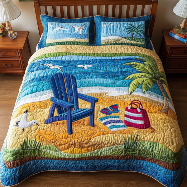 Relaxing Beach quilted 3-piece bedding set on a made bed in a light coastal bedroom