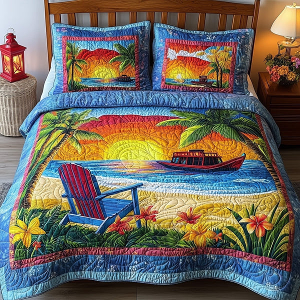 Relaxing Beach quilted 3-piece bedding set on a made bed in a light coastal bedroom