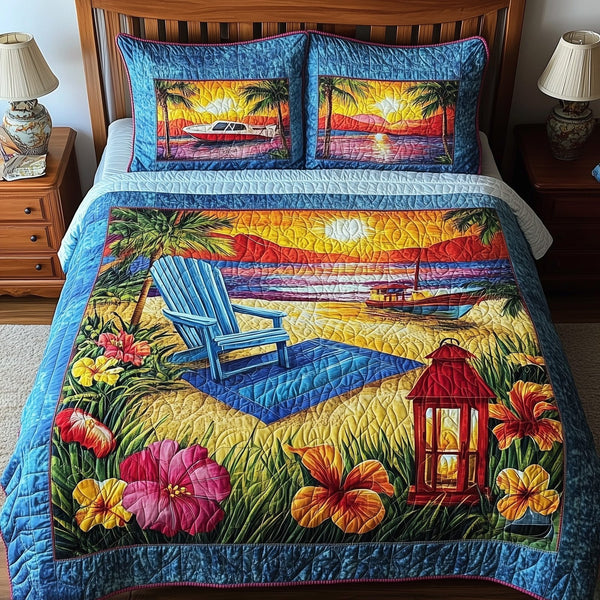 Relaxing Beach quilted 3-piece bedding set on a made bed in a light coastal bedroom