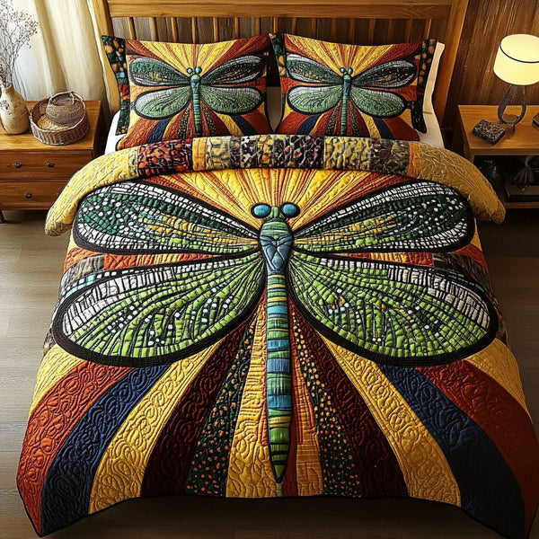 Resilient Grace quilted 3-piece bedding set on a made bed with two matching pillow shams