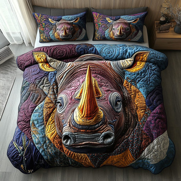 Rhino Majesty quilted 3-piece bedding set on a made bed with two matching pillow shams