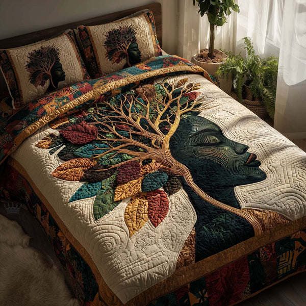 Rich Radiance quilted 3-piece bedding set on a made bed with two matching pillow shams